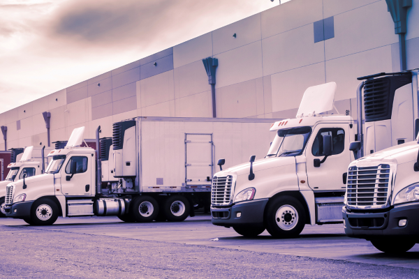 trucks loading at warehouse